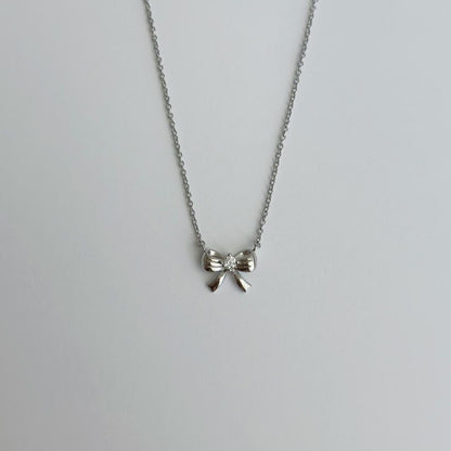 Silver ribbon bow necklace