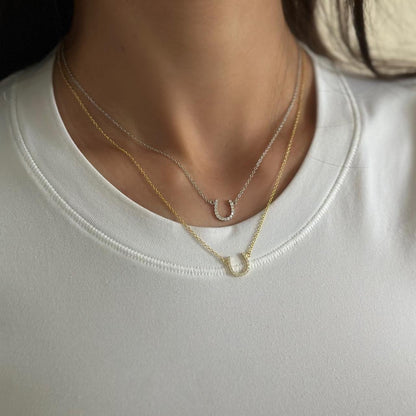 Gold horse shoe necklace