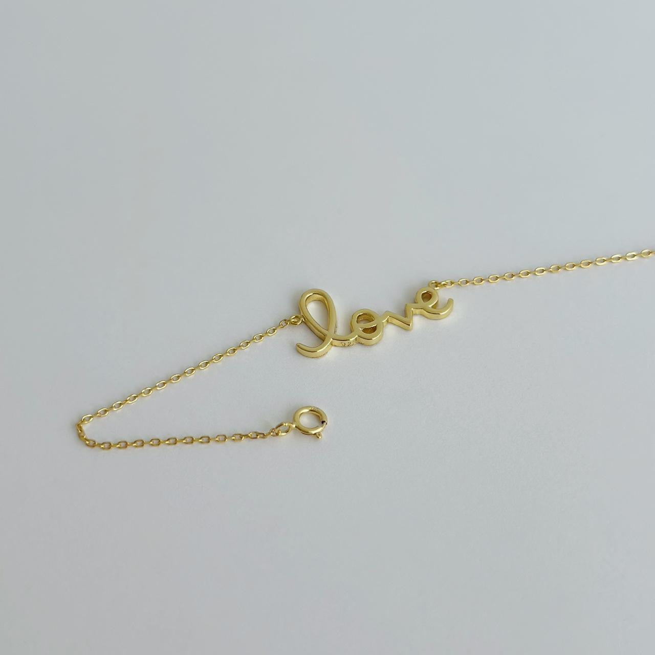 Gold love bracelet