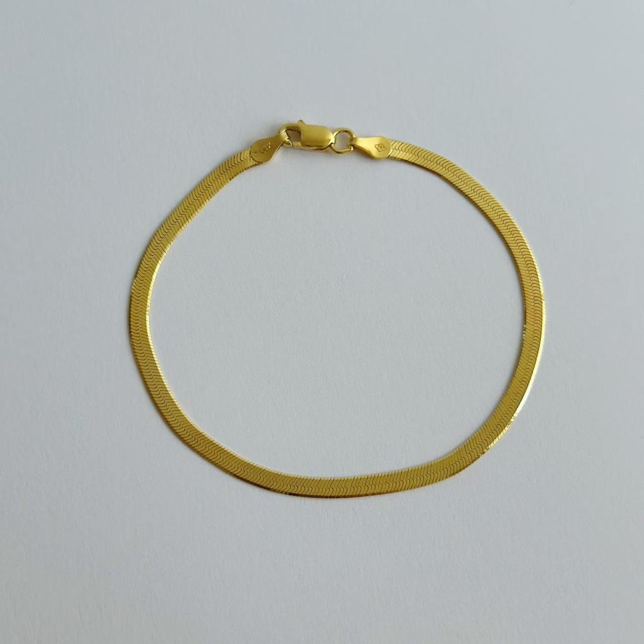 Gold herringbone bracelet