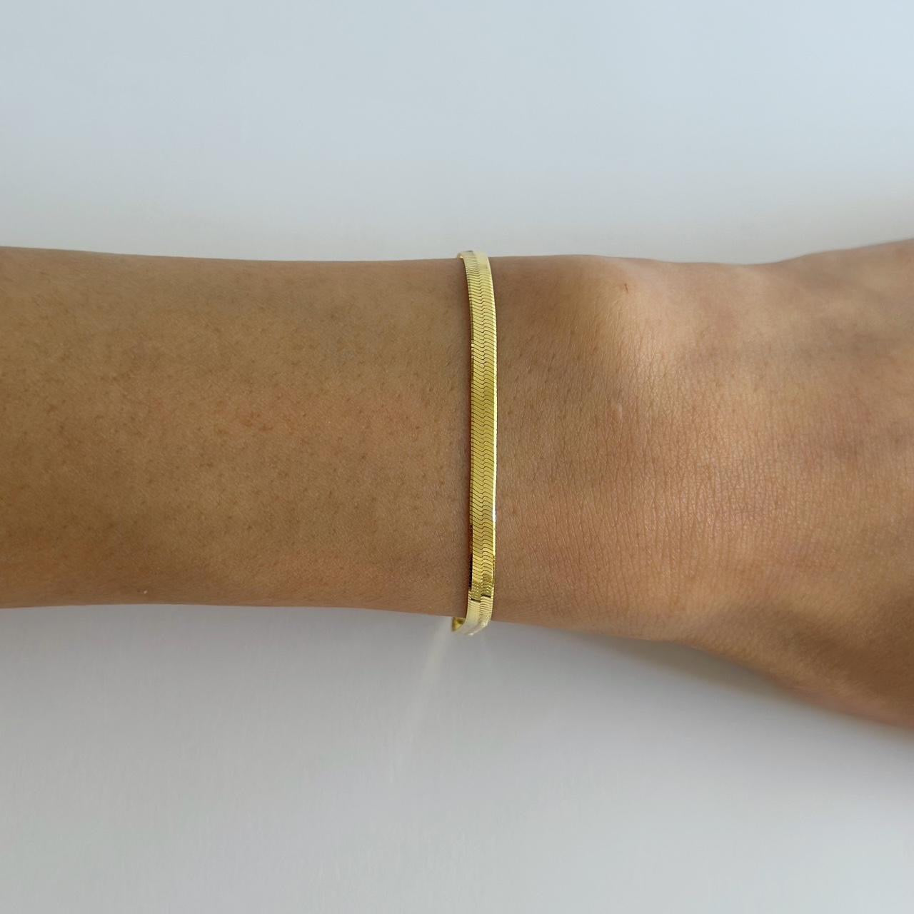 Gold herringbone bracelet