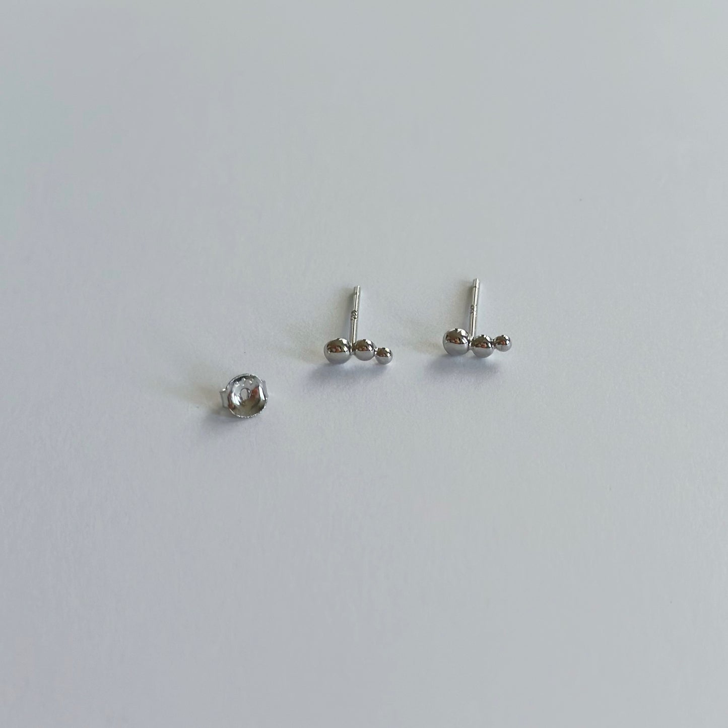 Silver pebble stud earrings