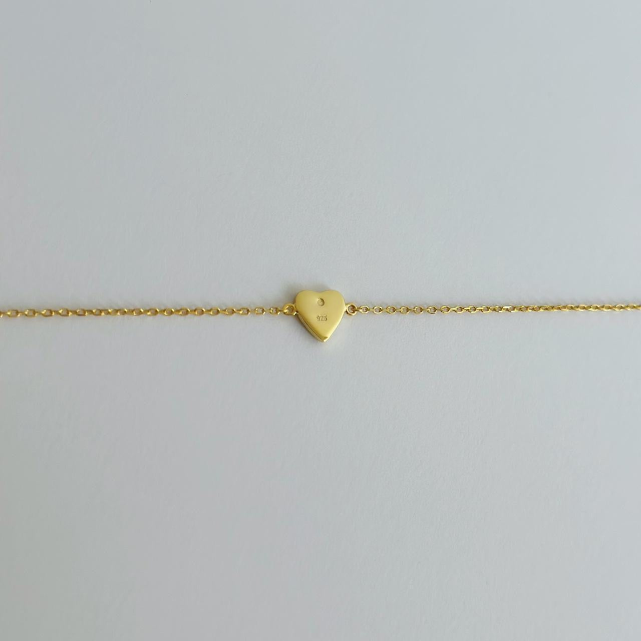 Gold enamel heart bracelet