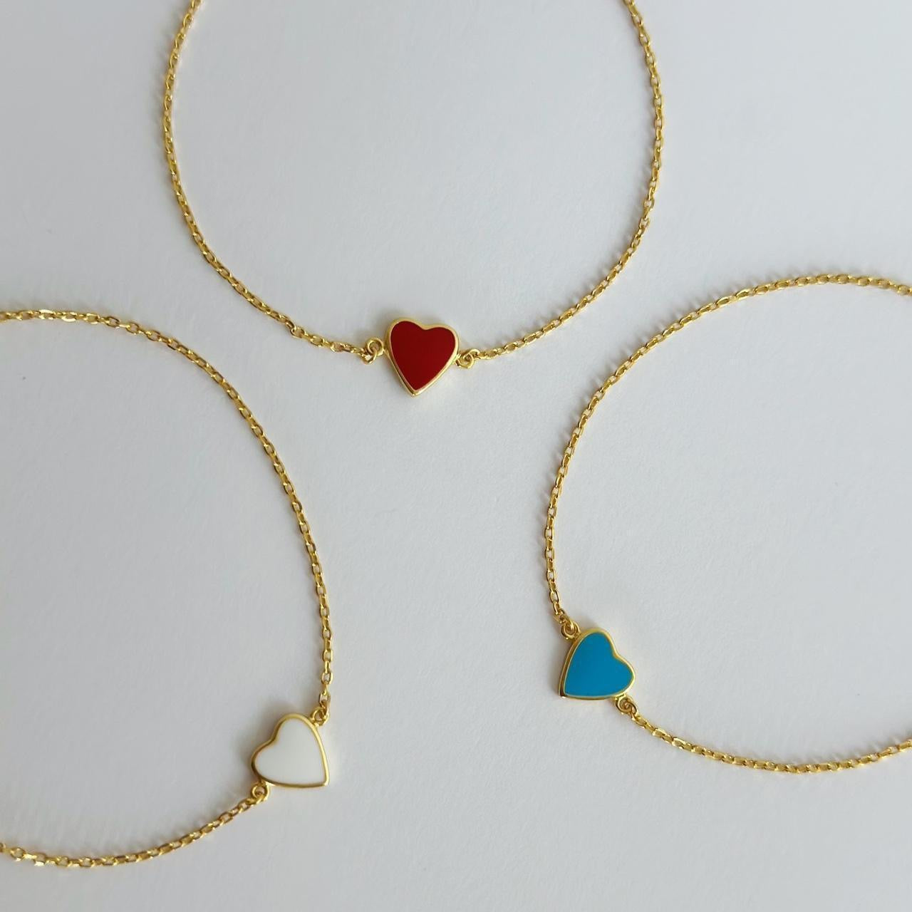 Gold enamel heart bracelet