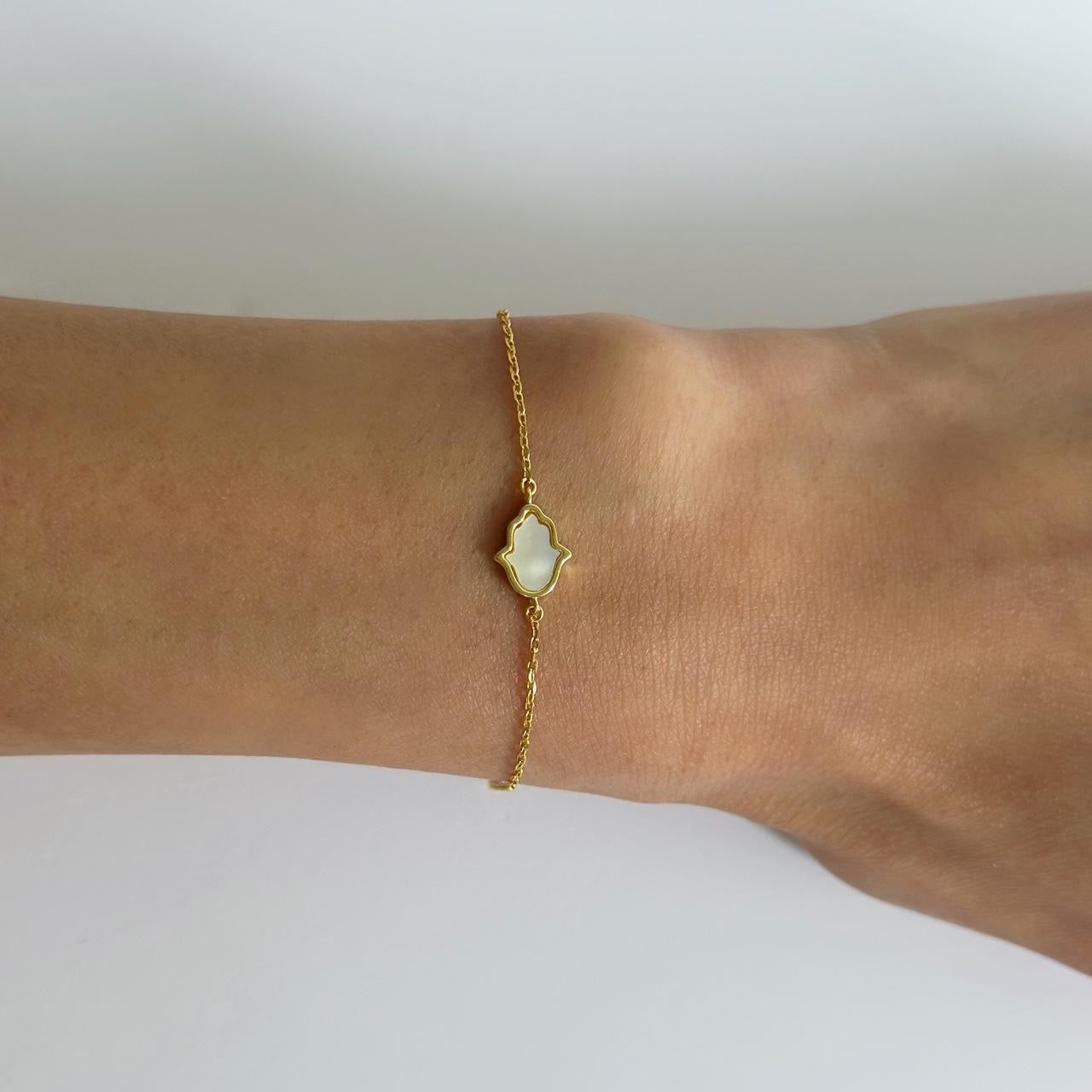 Gold mother of pearl hamsa hand bracelet