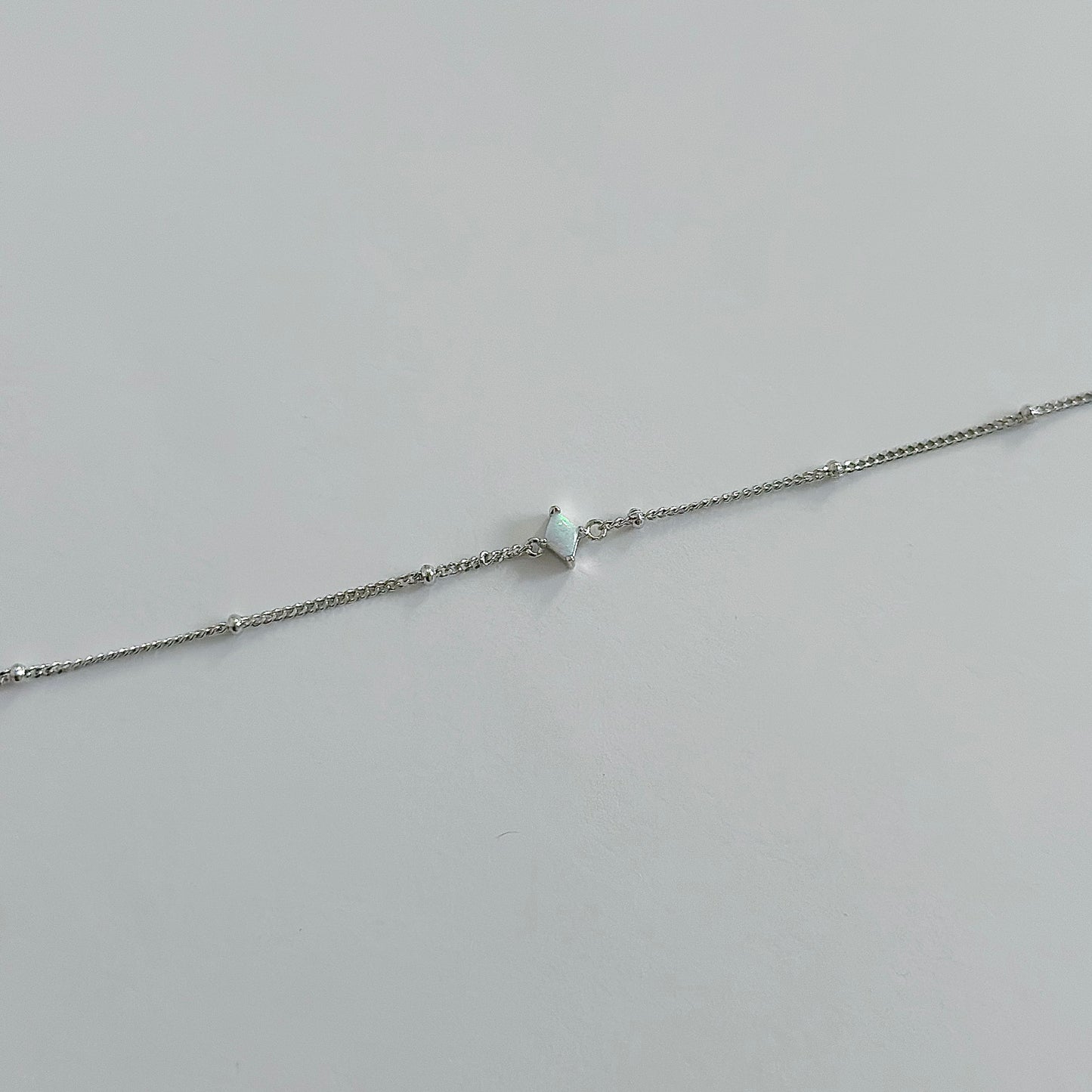 Silver diamond opal bracelet