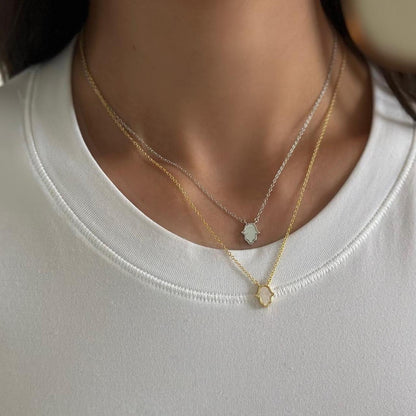 Gold mother of pearl hamsa hand necklace