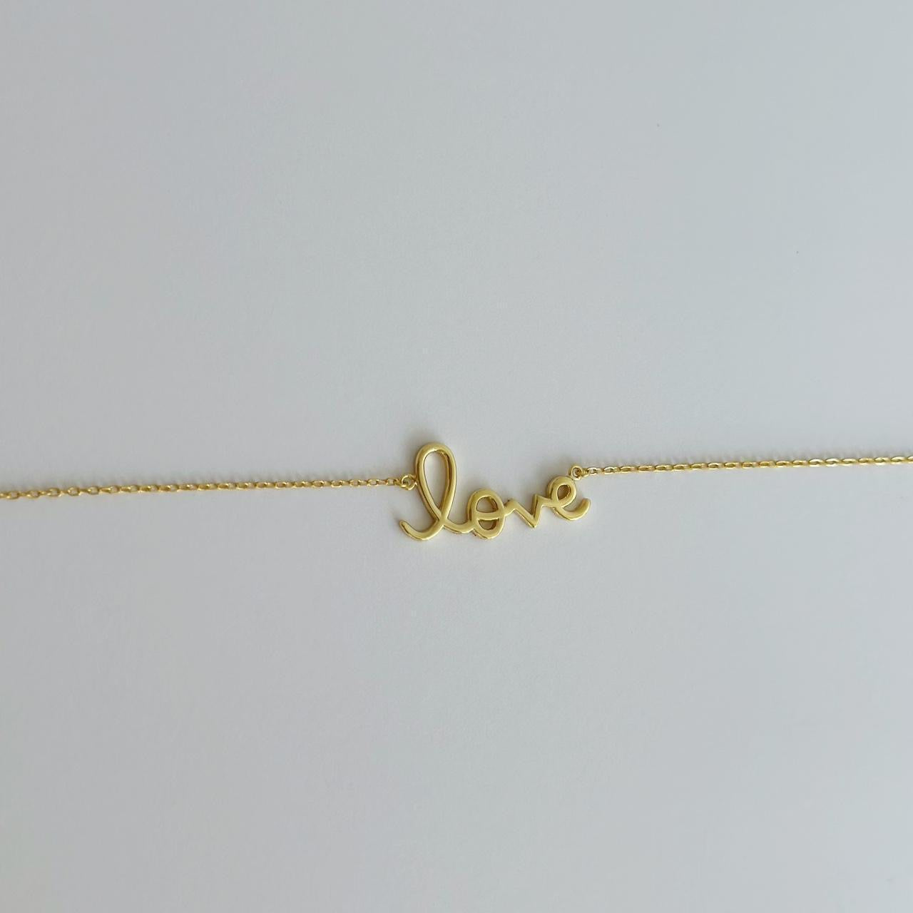 Gold love bracelet