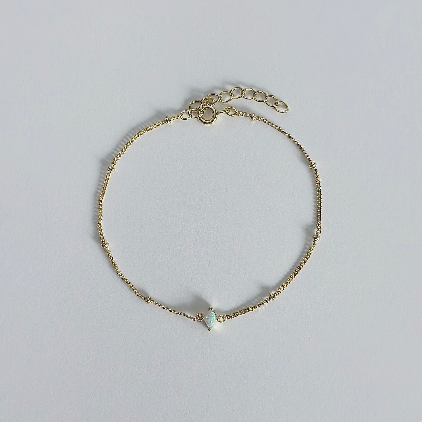 Gold diamond opal bracelet