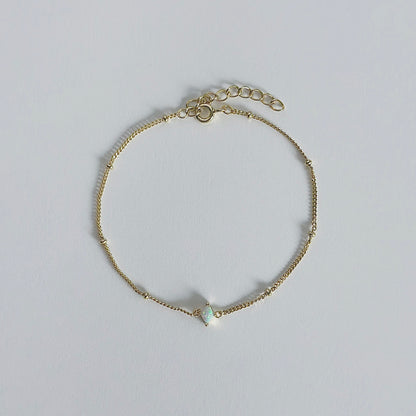 Gold diamond opal bracelet