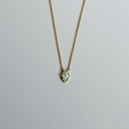 Gold mother of pearl hamsa hand necklace