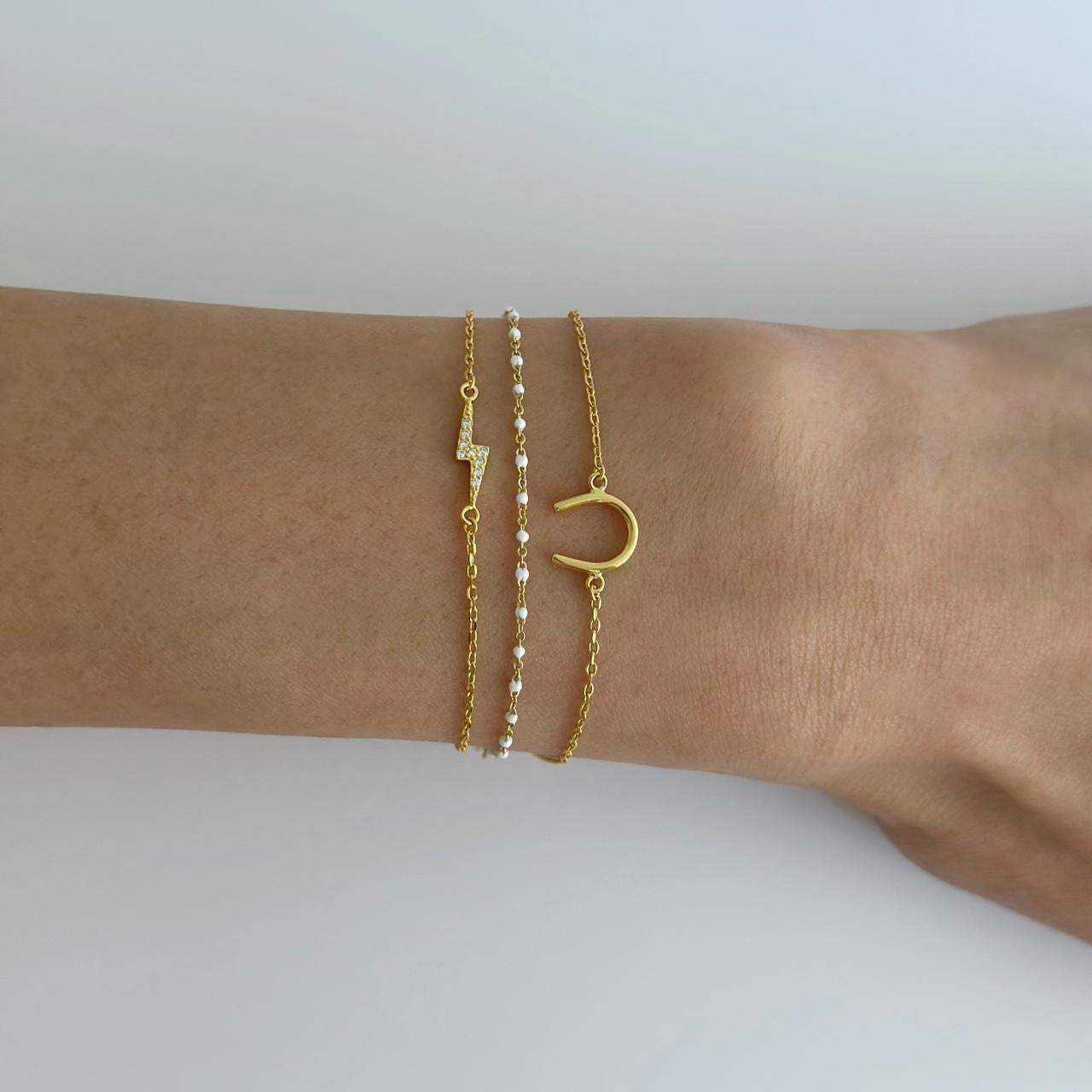 Gold horse shoe bracelet