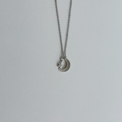 Silver moon & star pave necklace