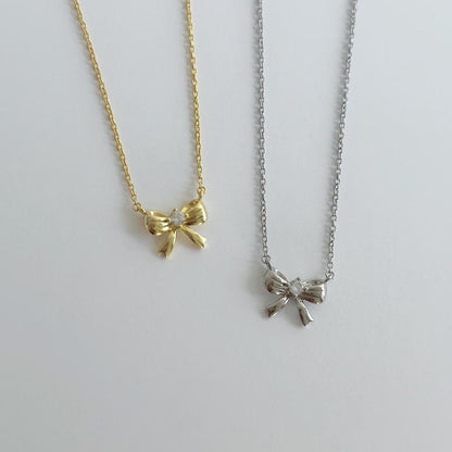 Silver ribbon bow necklace