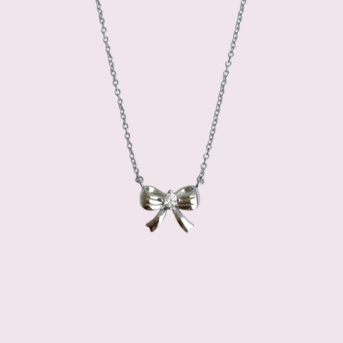 Silver ribbon bow necklace