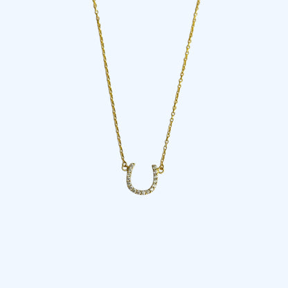 Gold horse shoe necklace