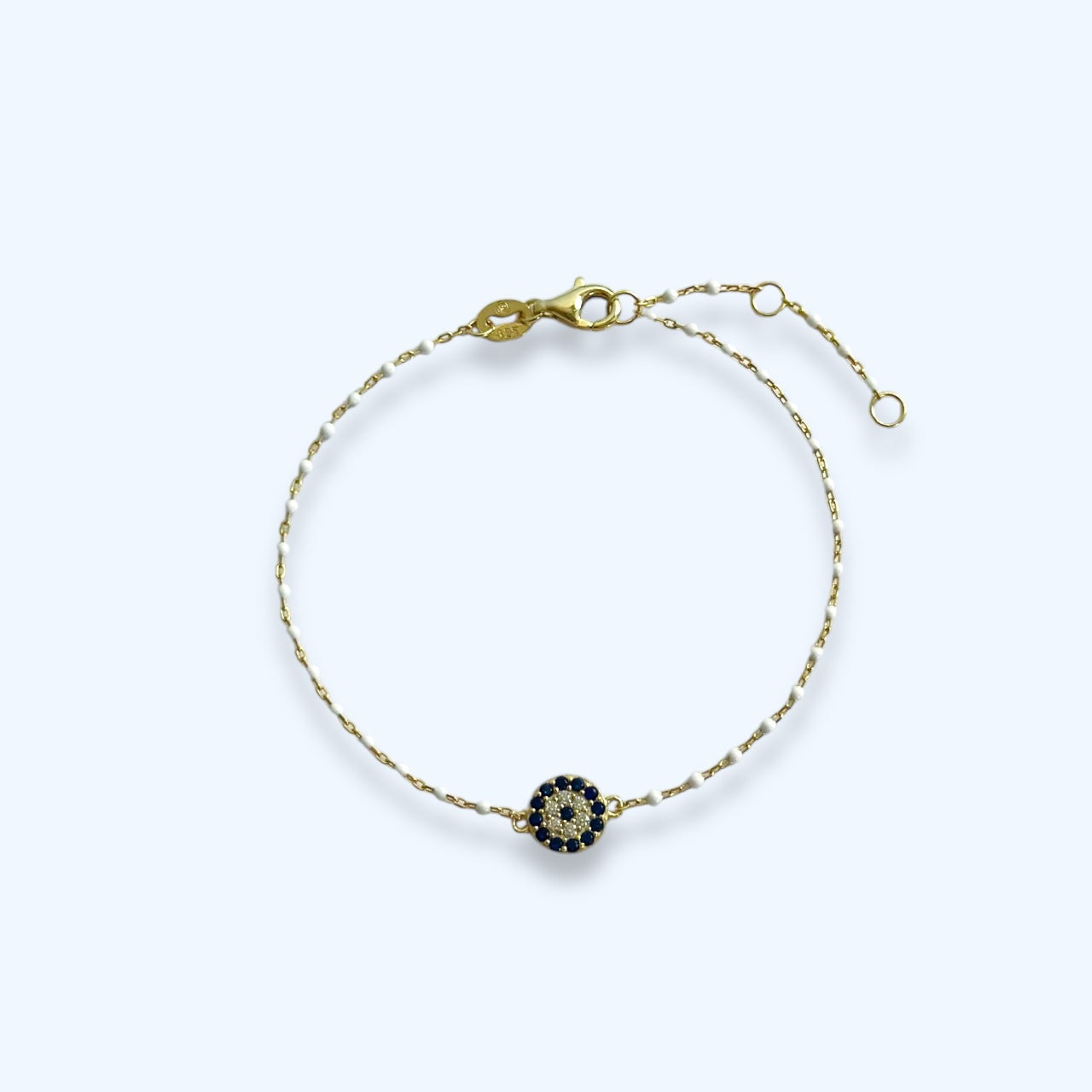 Gold pave evil eye white enamel bracelet