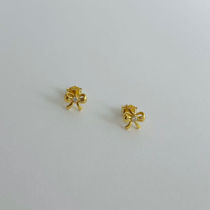 Gold bow studs earrings