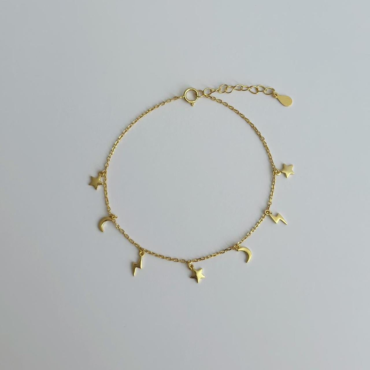 Gold night charm bracelet