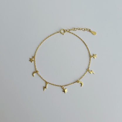 Gold night charm bracelet