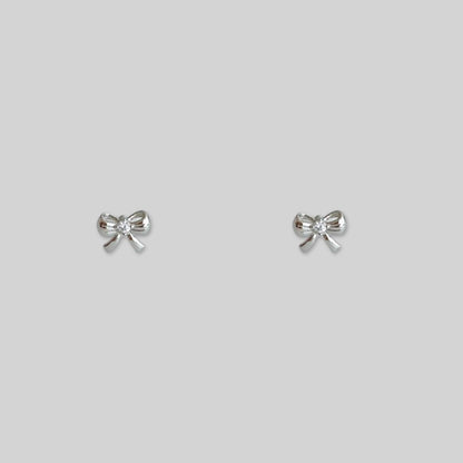 Silver bow studs earrings