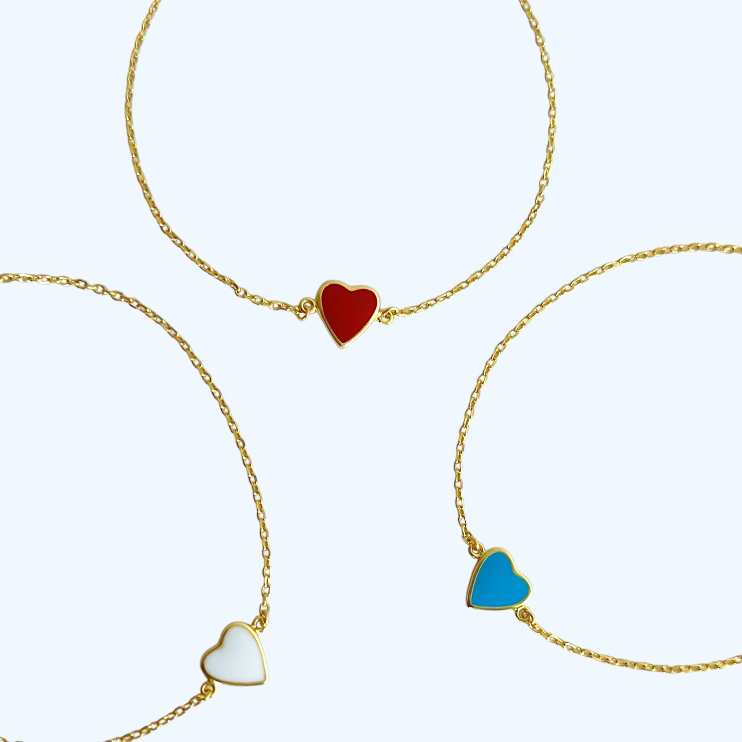 Gold enamel heart bracelet